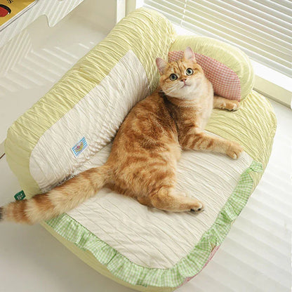 Soft & Cozy Cat Sofas — Perfect Lounging Spots for Happy Indoor Cats featuring a relaxed cat on a comfortable sofa.