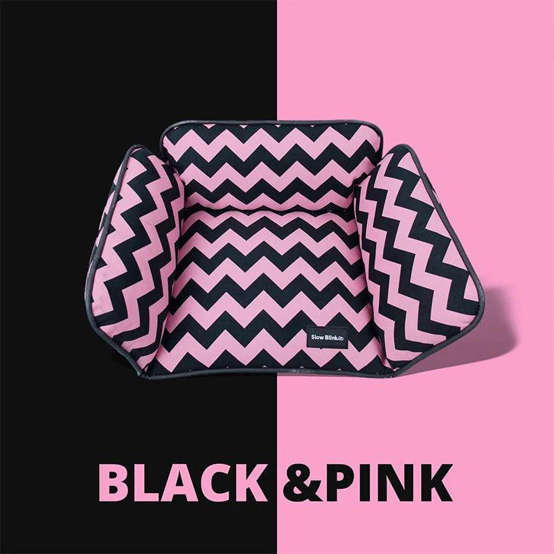 Memphis-Style Elevated Cat Hammock & Woven Wool Cat Cave in black and pink zigzag pattern.