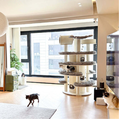 Luxury Multi-Level Cat Tower for Indoor Cats in a modern living room with cats playing and relaxing.