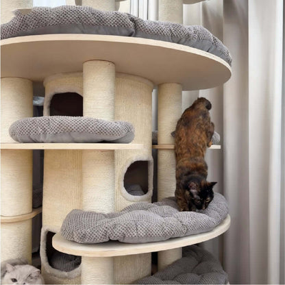 Luxury Multi-Level Cat Tower for Indoor Cats with a cat exploring the levels and comfortable resting areas.