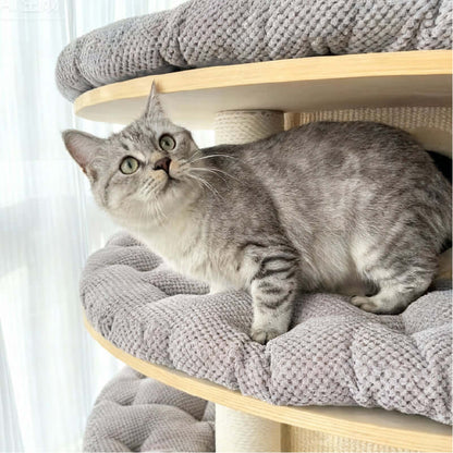 Luxury Multi-Level Cat Tower for Indoor Cats with a comfortable gray cat resting on soft platforms.