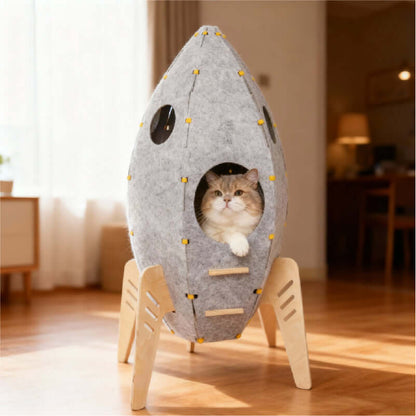 Rocket Cat House & Tower — Modern Space-Style Indoor Furniture for Cats with a cat peeking out.