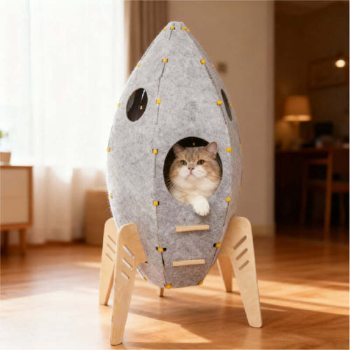Rocket Cat House & Tower — Modern Space-Style Indoor Furniture for Cats with a cat peeking out.