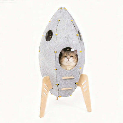 Rocket Cat House & Tower — Modern Space-Style Indoor Furniture for Cats with a cozy cat inside.