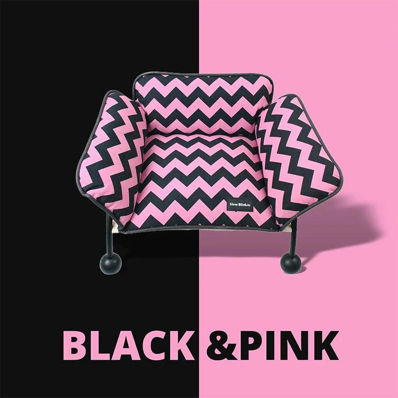 Memphis-Style Elevated Cat Hammock & Woven Wool Cat Cave in black and pink zigzag pattern.