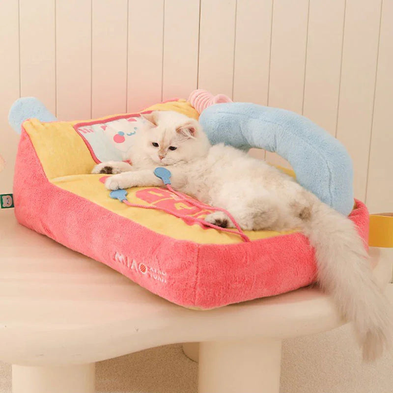 Kawaii Phone Sofa Bed for Cat – Cute & Cozy Lounge for Your Kitty, featuring a fluffy cat lounging comfortably on the colorful bed.