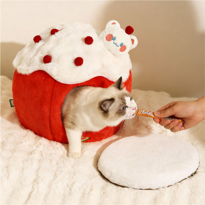 Snowball & Strawberry Cat Cave Bed — Soft & Cozy with a cat peeking out and a person offering a treat.