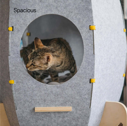 Rocket Cat House & Tower — Modern Space-Style Indoor Furniture for Cats with a cat exploring inside.