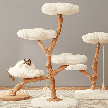 A realistic camera shot of the KtKitty Clouds Deluxe Solid Wood Cat Tree in a simple, minimalist room. The photo showcases the natural wood grain of the cloud-shaped platforms and sturdy trunk with authentic colors and soft indoor shadows.