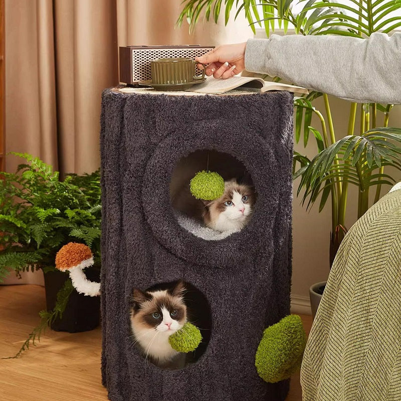 Multi-Functional Shared Living Stump: Designer Side Table, Stool, & All-in-One Cat Tree with two cats inside.