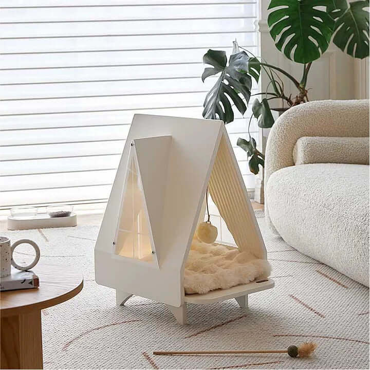 Cozy modern cat house as an indoor cat tree for climbing, scratching, and relaxing in a stylish home setting.