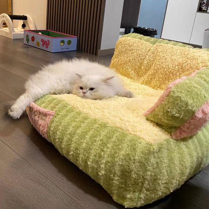 Cat lounging on peach avocado pet bed in bedroom - KtKitty