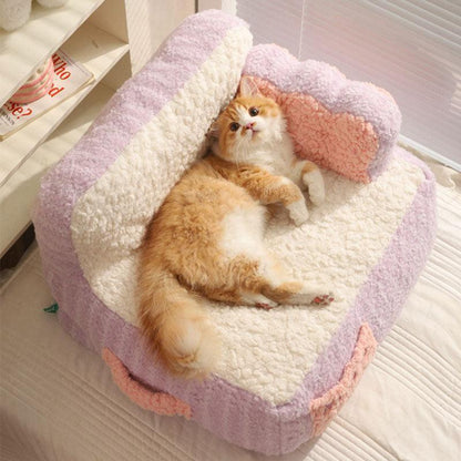 Hand touching plush surface of taro cream pet bed - KtKitty