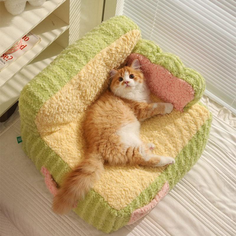 Portable cake sofa cat bed in bright indoor setting - KtKitty