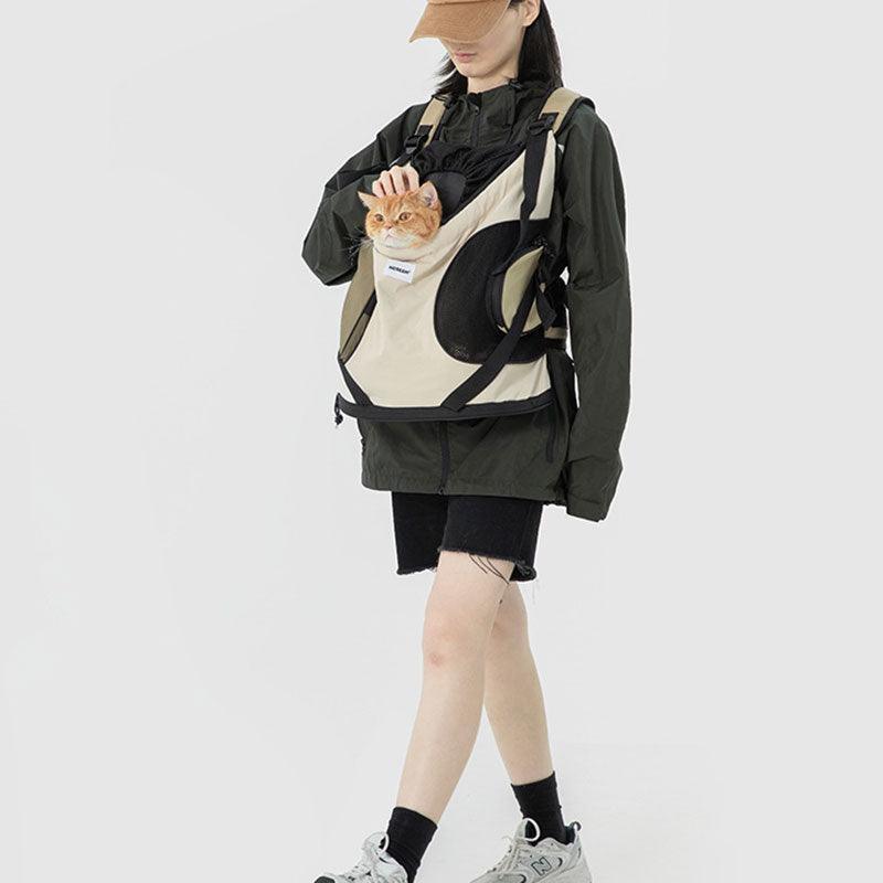 Luxury Cat Carrier Backpack – Breathable Front Pack for Travel & Daily Use, featuring a person carrying a cat comfortably.