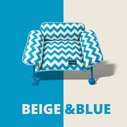 Memphis-Style Elevated Cat Hammock & Woven Wool Cat Cave in beige and blue zigzag pattern.