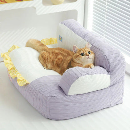 Soft & Cozy Cat Sofas — Perfect Lounging Spots for Happy Indoor Cats with a relaxed cat lounging comfortably.