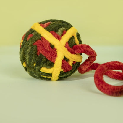 The yarn ball with bell, a durable and engaging toy for kittens.