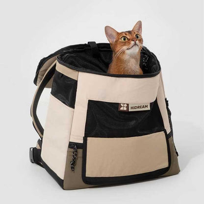 Portable Cat Backpack – Front & Back Carry with a curious cat peeking out from the top.
