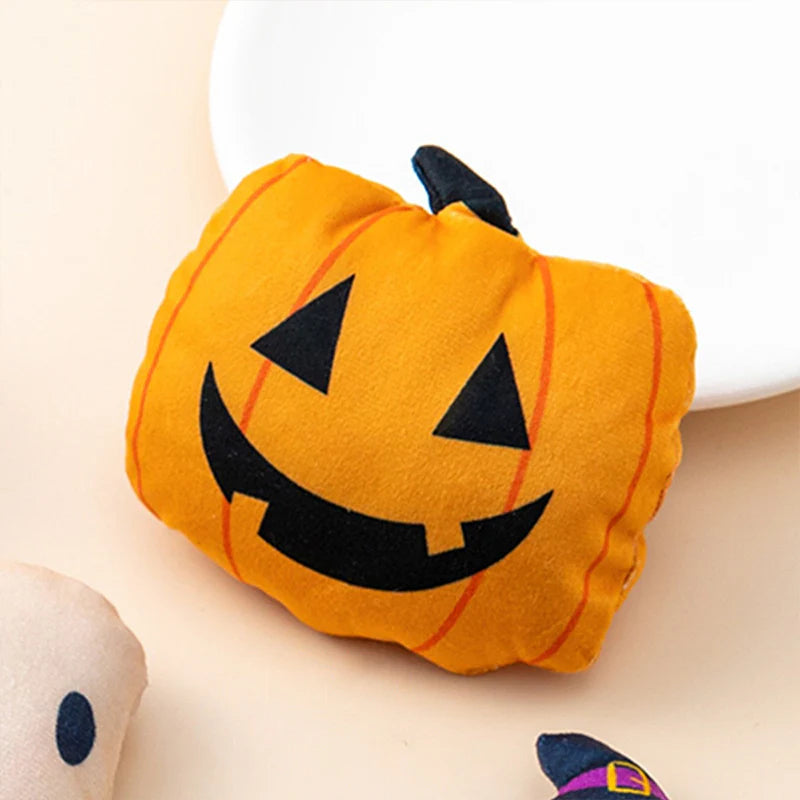 Halloween-themed catnip toy shaped like a pumpkin.