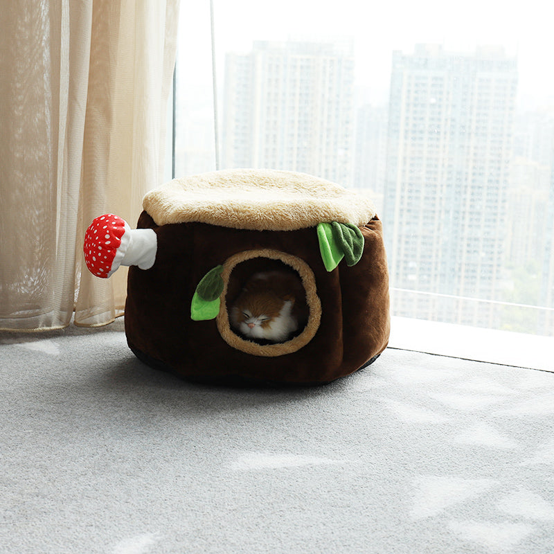 Cat peacefully resting in the Stump and Red Mushroom Cat Bed.