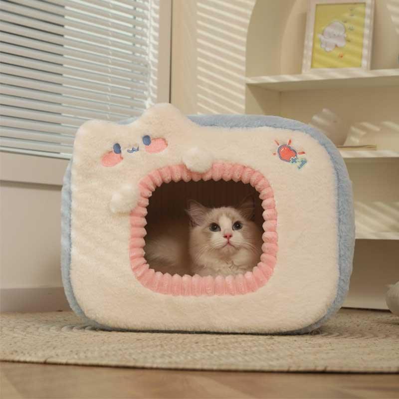 Warm Two-Color Cat Bed Cave – Cozy & Safe Hideaway for Your Cat - Soft plush cat cave with a kitten inside.