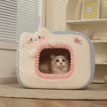 Warm Two-Color Cat Bed Cave – Cozy & Safe Hideaway for Your Cat - Soft plush cat cave with a kitten inside.