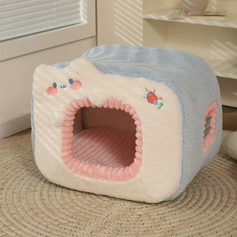 Warm Two-Color Cat Bed Cave – Cozy & Safe Hideaway for Your Cat in plush blue and pink design.