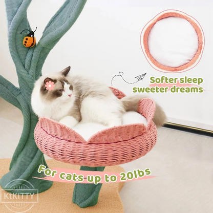 Yellow Tulip Cat Tree – Sturdy & Elegant with a cat lounging in a cozy pink flower-shaped bed.